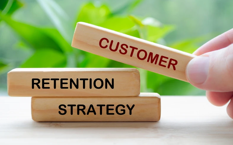 Hand holding customer block over strategy stack