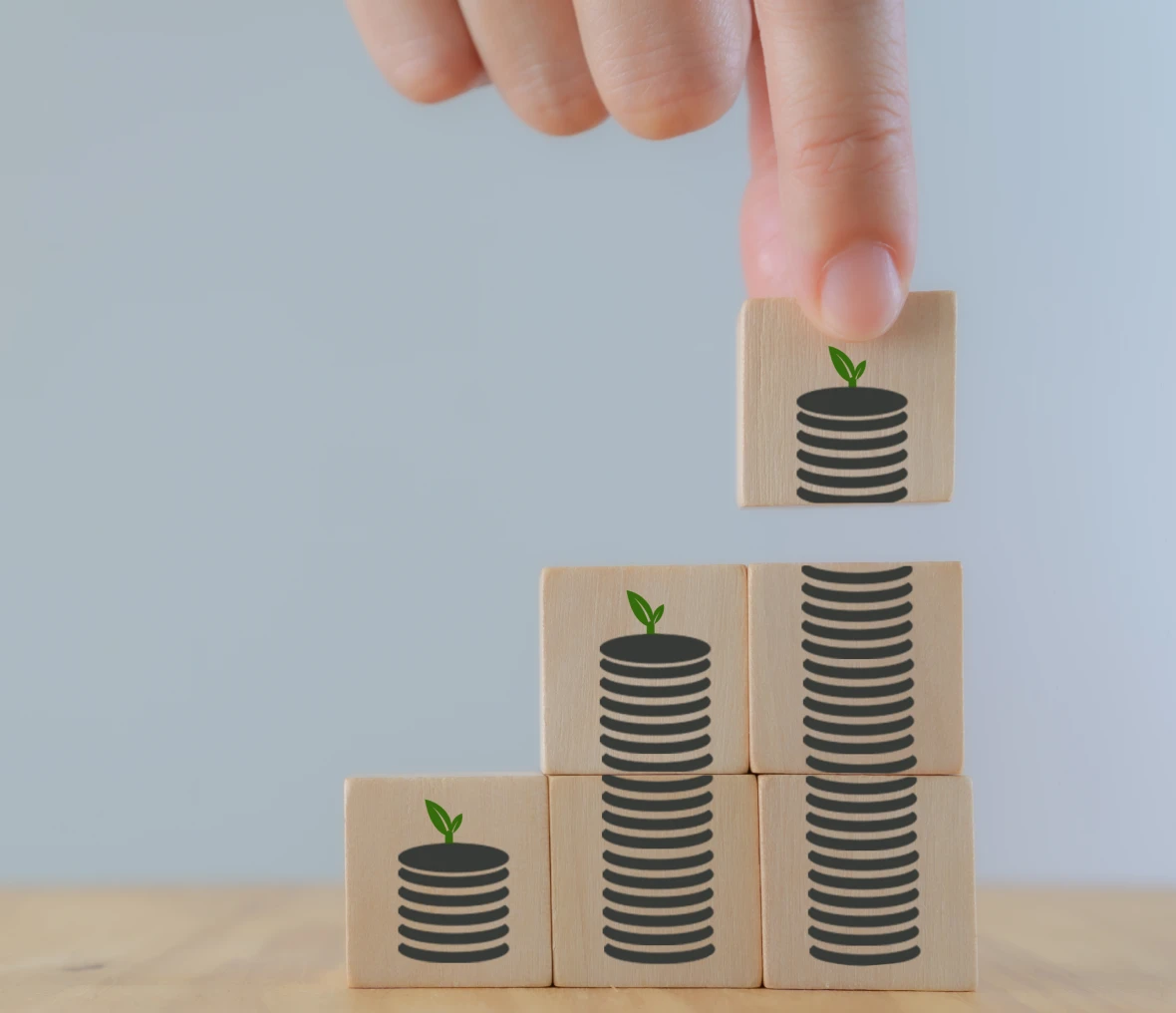 Wooden blocks with coin illustrations