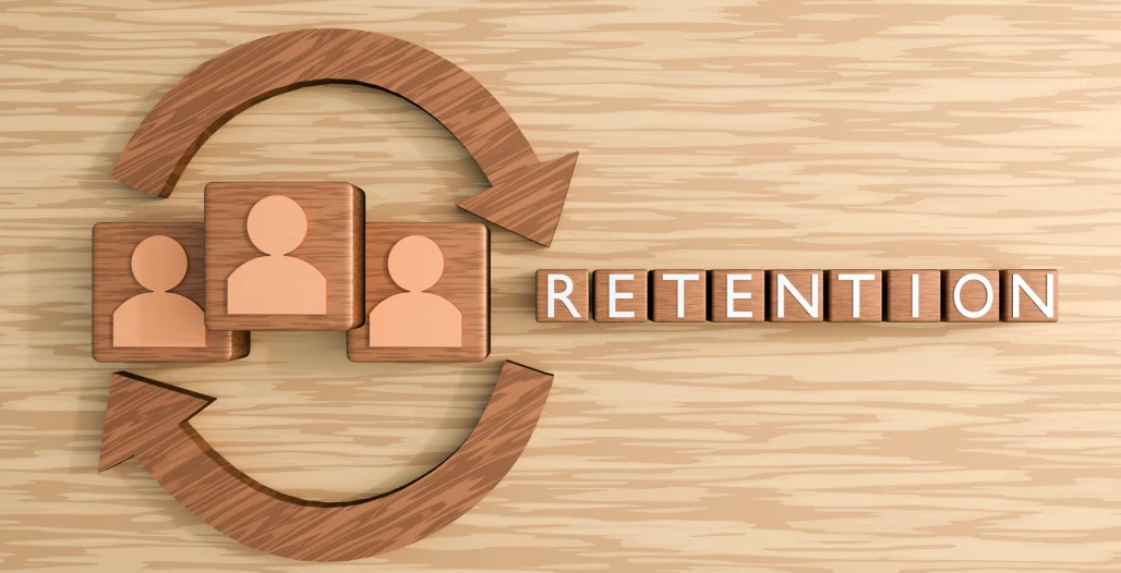 Employee retention symbol with wooden arrows